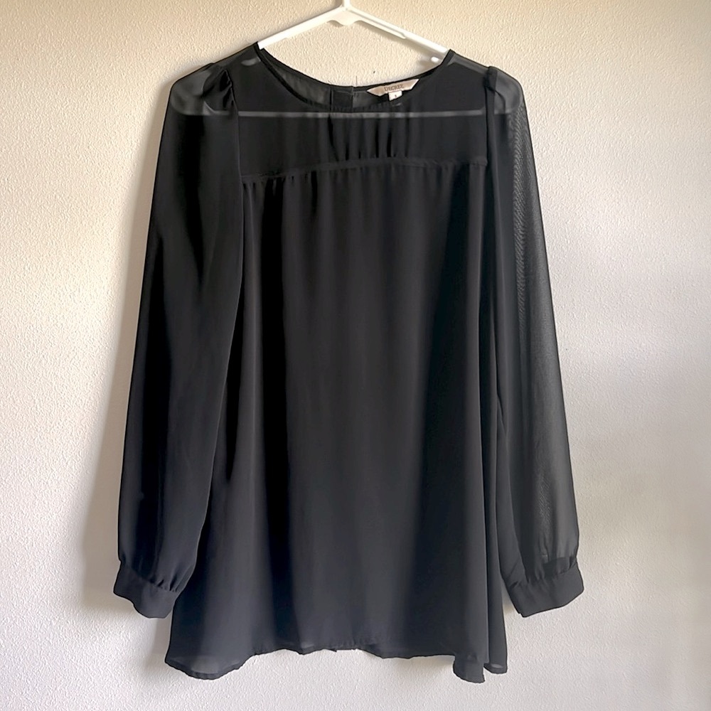 Long sleeved black dress top